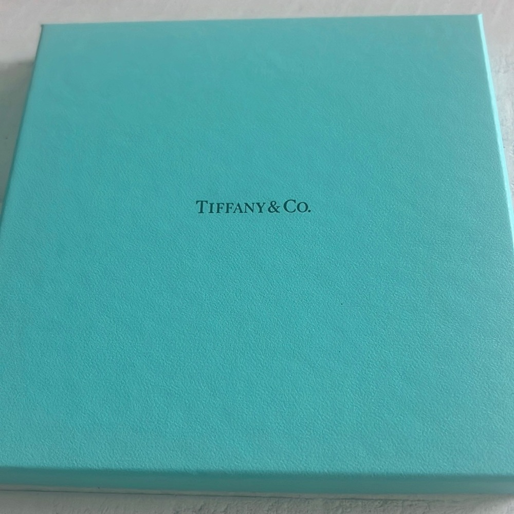 Three empty authentic Tiffany Boxes size 6” x 6” in pristine condition.